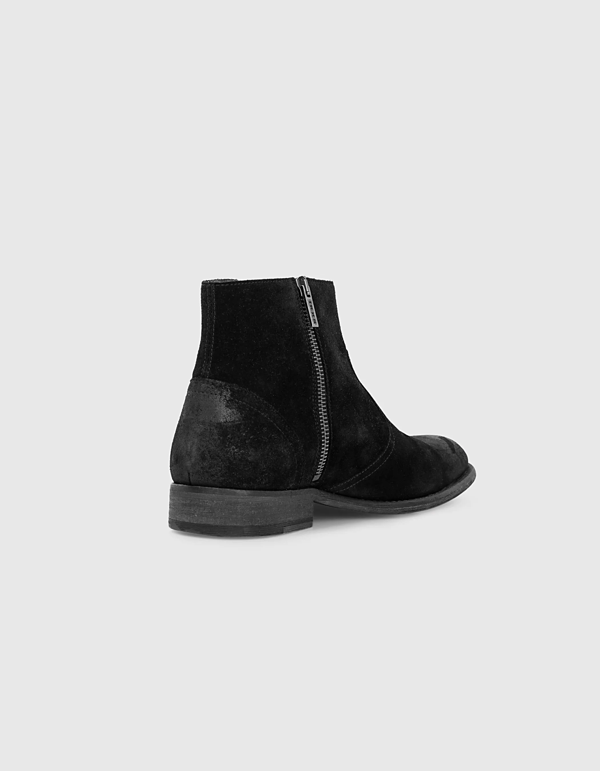 Boots noires zippées en cuir velours Homme