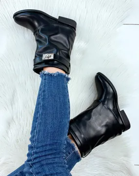 Bottines noires retroussées compensée