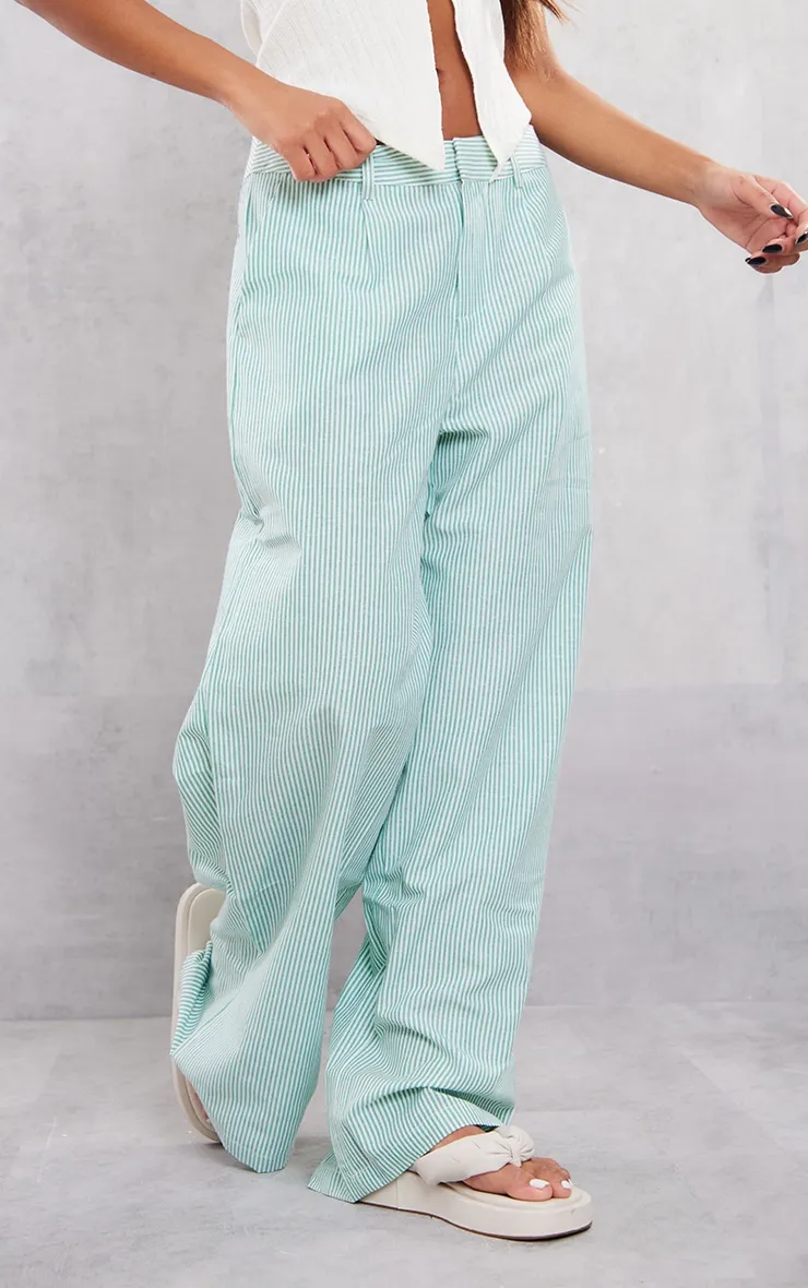 Pantalon ajusté effet lin vert à fines rayures