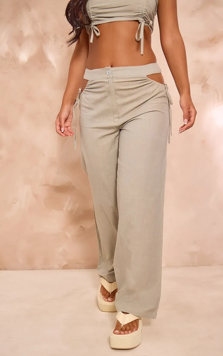 Petite Pantalon large effet lin vert sauge à découpes sur le côté